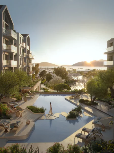 Moderne Apartmentanlage in Porto Montenegro mit Pool, Balkonen und Blick auf den Yachthafen Tivat bei Sonnenuntergang