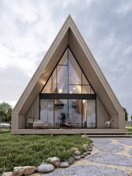 Modern A-frame chalet in Kolašin Montenegro with wooden façade, large glass front and well-tended garden