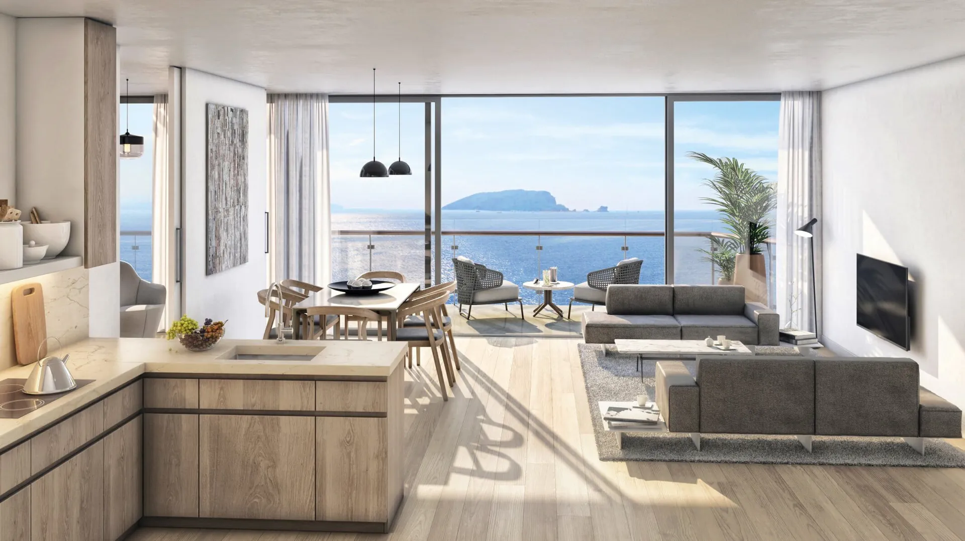Penthouse in Budva mit Wohnbereich und Küche Offener Wohnbereich mit Küche und Essplatz in einem Penthouse in Budva mit Meerblick